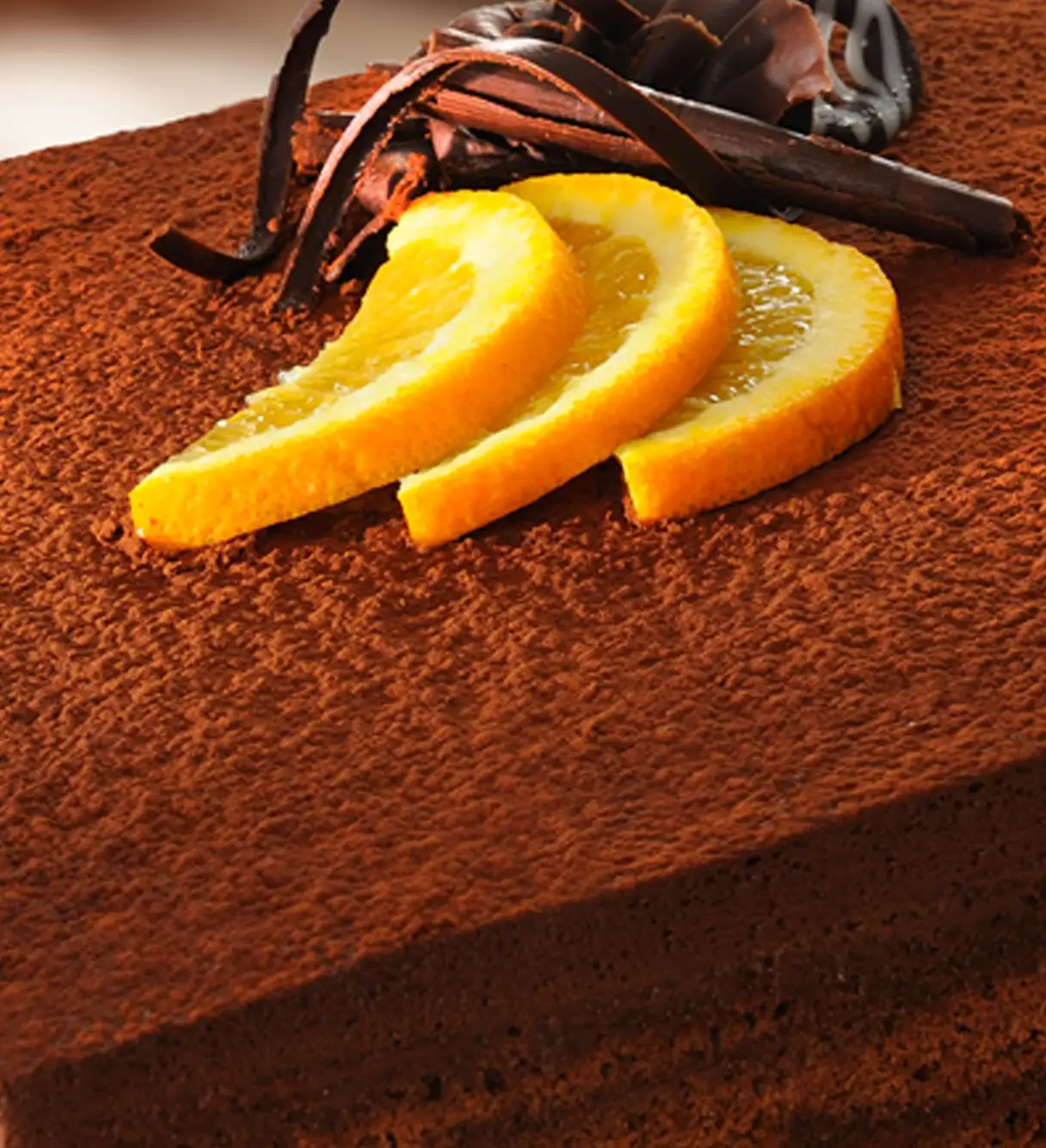Dark chocolate orange cake with candied orange — dessert photography Dubai