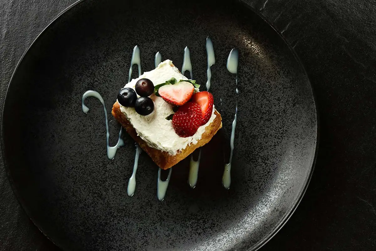 Berry mascarpone dessert with strawberries and blueberries — luxury food photography Dubai