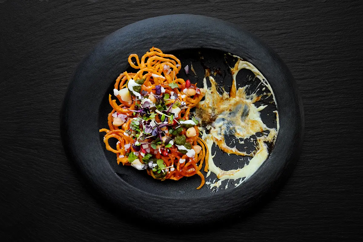 Spiced sweet potato fries with hummus and chickpeas — food styling photography Dubai