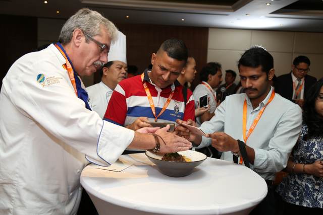 Attendees exploring the interactive Smart Kitchen kiosk